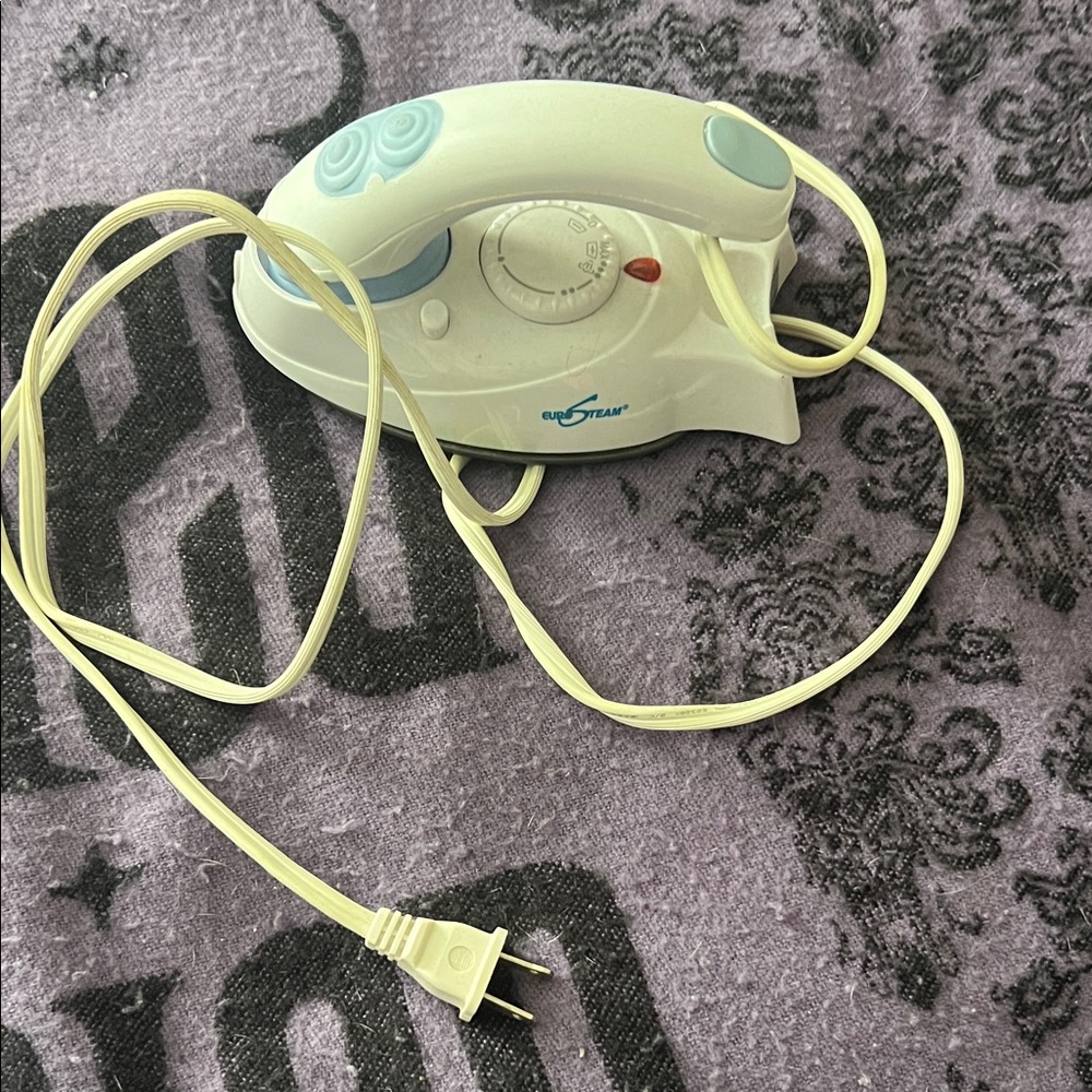 White and Blue Travel Iron